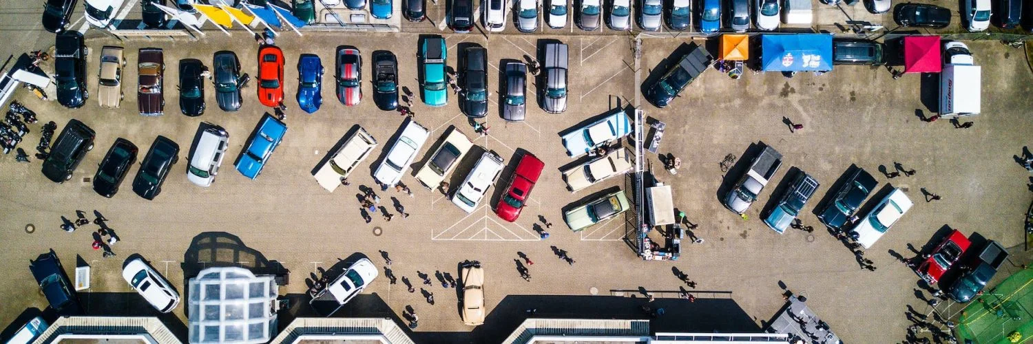 high angle photo of vehicles parked near building