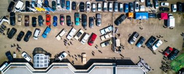 high angle photo of vehicles parked near building